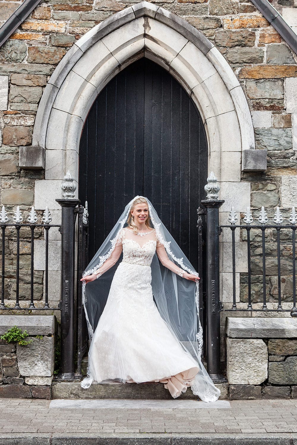 Bride in front of church Kinsale