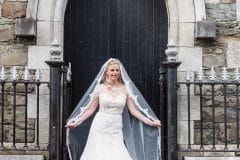 Bride in front of church Kinsale